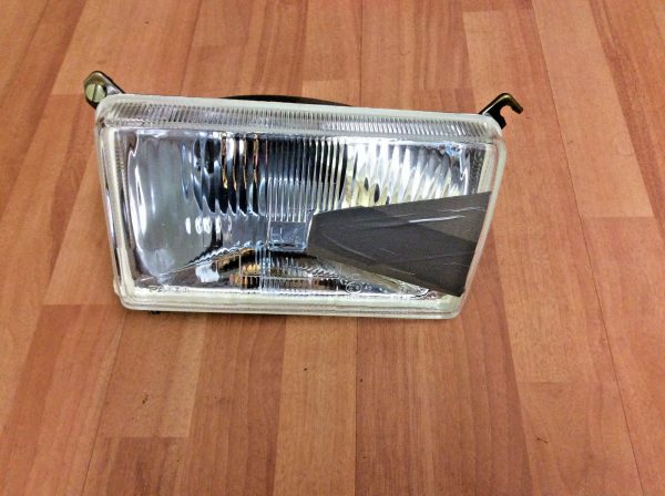 Ford Cargo Head Light O/S-LHD now supplied with beam deflcters to be used in this country